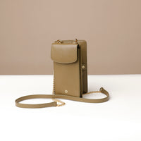 side view of a open green danilos leather multi smartphone alessia over a white background