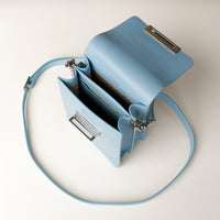 Top view of open light blue Danilos Multi-Smartphone Clariss Bag leather crossbody