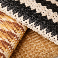 Close-up of woven textures including black and white chevron pattern, brown and beige wicker, and natural woven material.