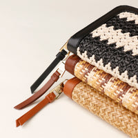 Stack of woven bags with a crochet top on a light background