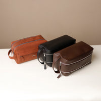 three-toiletry-bag-leather-tan-brown-black-with-silver-hardware