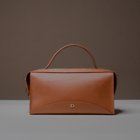 Front View of Palisander Avela Bag with top handle and detachable strap