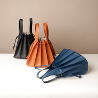 Three Luxury leather bucket bag with multiple carry options
