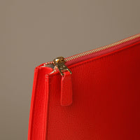 Close up view of red Mathias Document Leather executive folder with multi-functional pockets