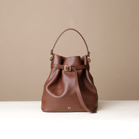 Front View of Maroon stylish leather handbag with a structured silhouette and versatile design, perfect for everyday wear and special occasions.