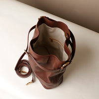 Top View of Open Maroon stylish leather handbag with a structured silhouette and versatile design, perfect for everyday wear and special occasions.