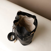 Top View of Open Black stylish leather handbag with a structured silhouette and versatile design, perfect for everyday wear and special occasions.