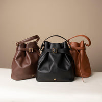 Trio stylish leather handbag with a structured silhouette and versatile design, perfect for everyday wear and special occasions.