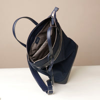 messenger-crossbodybag-ballistic-nylon-leather-details-transiktrek-blue-with-silver-hardware-open-upper-view