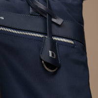 closeup-messenger-crossbodybag-ballistic-nylon-leather-details-transiktrek-blue-with-silver-hardware-with-brand-danilos