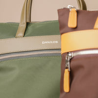 two-messenger-crossbodybag-ballistic-nylon-leather-details-transiktrek-green-with-olive-brown-with-yellow-with-visible-brand-danilos-front-view