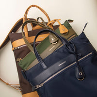 three-messenger-crossbodybag-ballistic-nylon-leather-details-transiktrek-green-brown-with-yellow-navy-upper-view-with-visible-brand-danilos