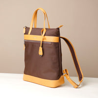 messenger-crossbodybag-ballistic-nylon-leather-details-transiktrek-brown-with-yellow-with-silver-hardware-lateral-view