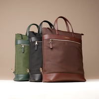 three-messenger-crossbodybag-ballistic-nylon-leather-details-transiktrek-green-brown-black-gold-hardware-front-view
