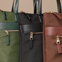 closeup-three-messenger-crossbodybag-ballistic-nylon-leather-details-transiktrek-green-brown-black-with-gold-hardware