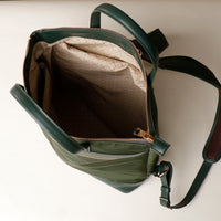 messenger-crossbodybag-ballistic-nylon-leather-details-transiktrek-green-with-gold-hardware-open-upper-view