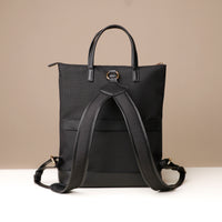 messenger-crossbodybag-ballistic-nylon-leather-details-transiktrek-black-with-gold-hardware-back-view