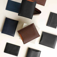 upper view of a nappa leather Milano wallets with card case holders over a beige background