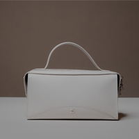 Front View of White Avela Bag with top handle and detachable strap