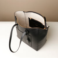 Top view of open black Emma Pebble Leather Tote Bag by Danilos