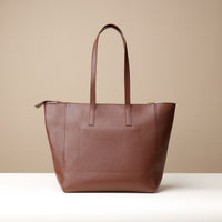 Back view of brown Emma Pebble Leather Tote Bag by Danilos