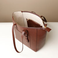 Top view of open brown Emma Pebble Leather Tote Bag by Danilos