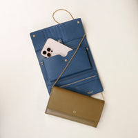 two wallets one closed and one open danilos clutch versaviva in blue leather with pouch for phone and card slots with gold zipper