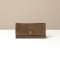 Brown suede Danilos clutch wallet with a visible Danilos logo on a beige background