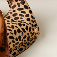 Leopard print Danilos handbag on a light background