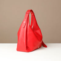Side view of red Mia Minimale Sr. handcrafted luxury leather hobo bag