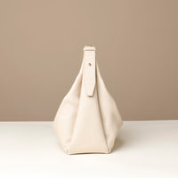 handbag, hobo bag, Mia Minimale Jr, white leather, with a strap with logo Danilos on it, side view