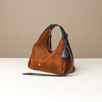 Mini Mia Minimale Jr in dark olive suede on neutral background