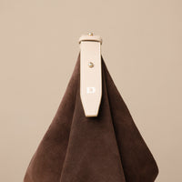 Mini Mia Minimale Jr in dark olive suede on neutral background