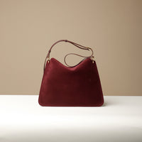 Back view of Red Suede Penelope Sr. bag in Brown with fold-over magnetic closure