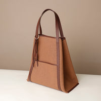 Mesh texture and leather trim close-up