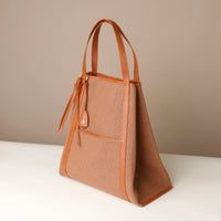 Top-down view of Tosca Isola tote bag with leather handles