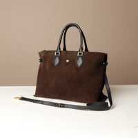Side view of tote brown saude bag