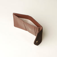 upper view of a Open Brown leather danilos wallet on a white background