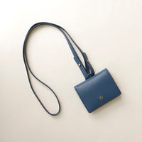Close-up of detachable chain strap on Olivia wallet crossbody