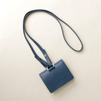 Side profile of Olivia wallet crossbody displaying slim silhouette